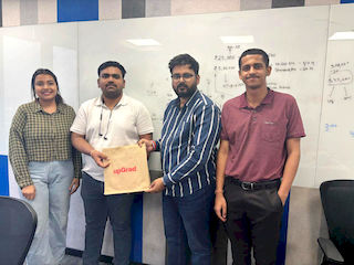 upGrad Ahmedabad office - student and parents with the counselling team after their study abroad session